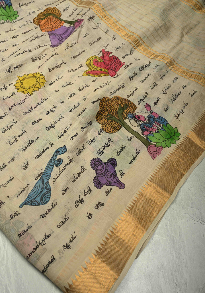 Telugu Script and Motiifs Theme : Natural Color Authentic Pen Kalamkari Handpainted on Pure Mangalagiri Silk Cotton Saree with Temple Zari Border