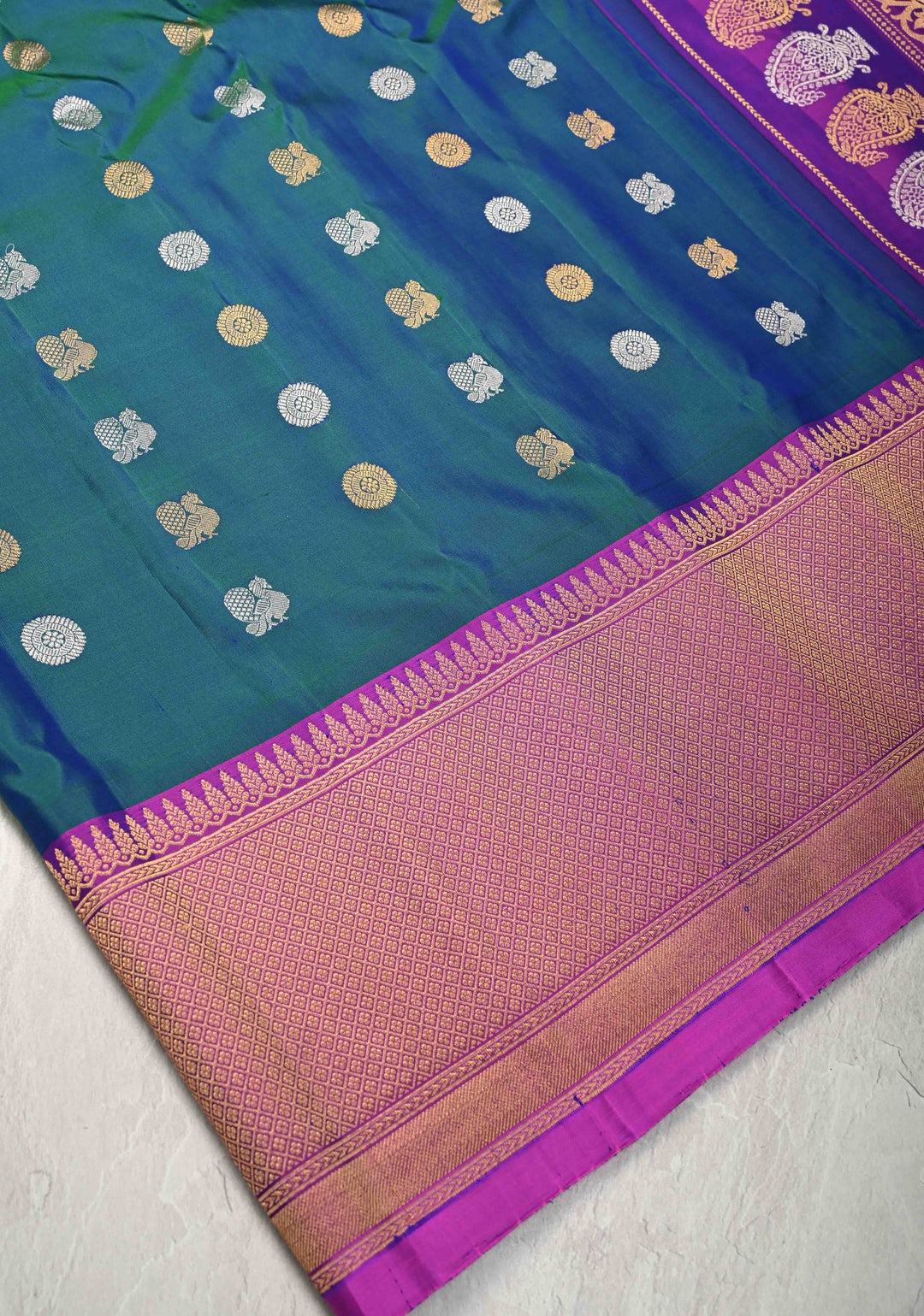 Peacock Blue Dual-Tone Gadwal Silk Saree with Gold-Silver Motifs and Contrast Zari Border | SILK MARK CERTIFIED