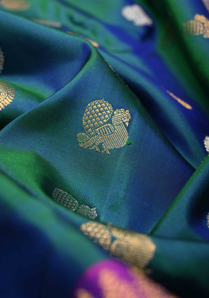 Peacock Blue Dual-Tone Gadwal Silk Saree with Gold-Silver Motifs and Contrast Zari Border | SILK MARK CERTIFIED