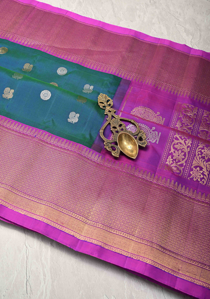 Peacock Blue Dual-Tone Gadwal Silk Saree with Gold-Silver Motifs and Contrast Zari Border | SILK MARK CERTIFIED