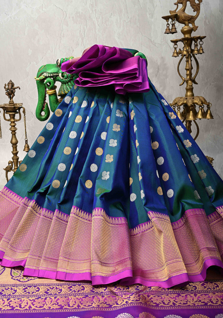 Peacock Blue Dual-Tone Gadwal Silk Saree with Gold-Silver Motifs and Contrast Zari Border | SILK MARK CERTIFIED