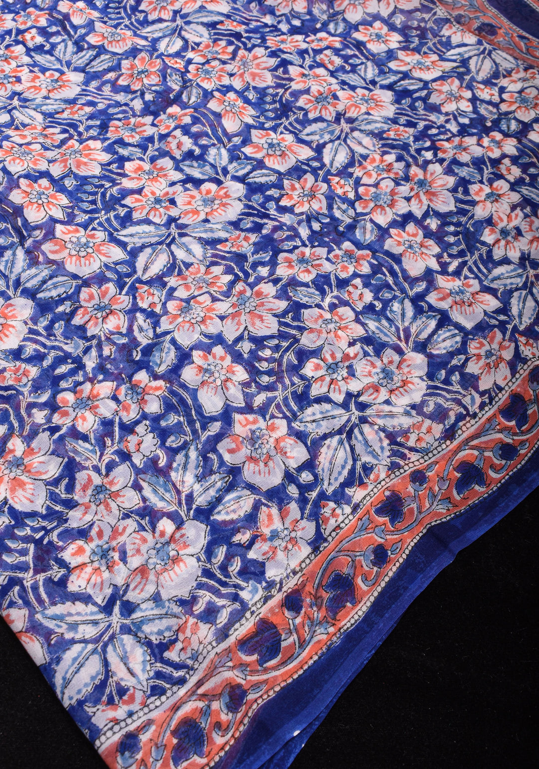 Mediterranean Blue Georgette Saree with Sanganeri Hand Block Print Florals and net tassels