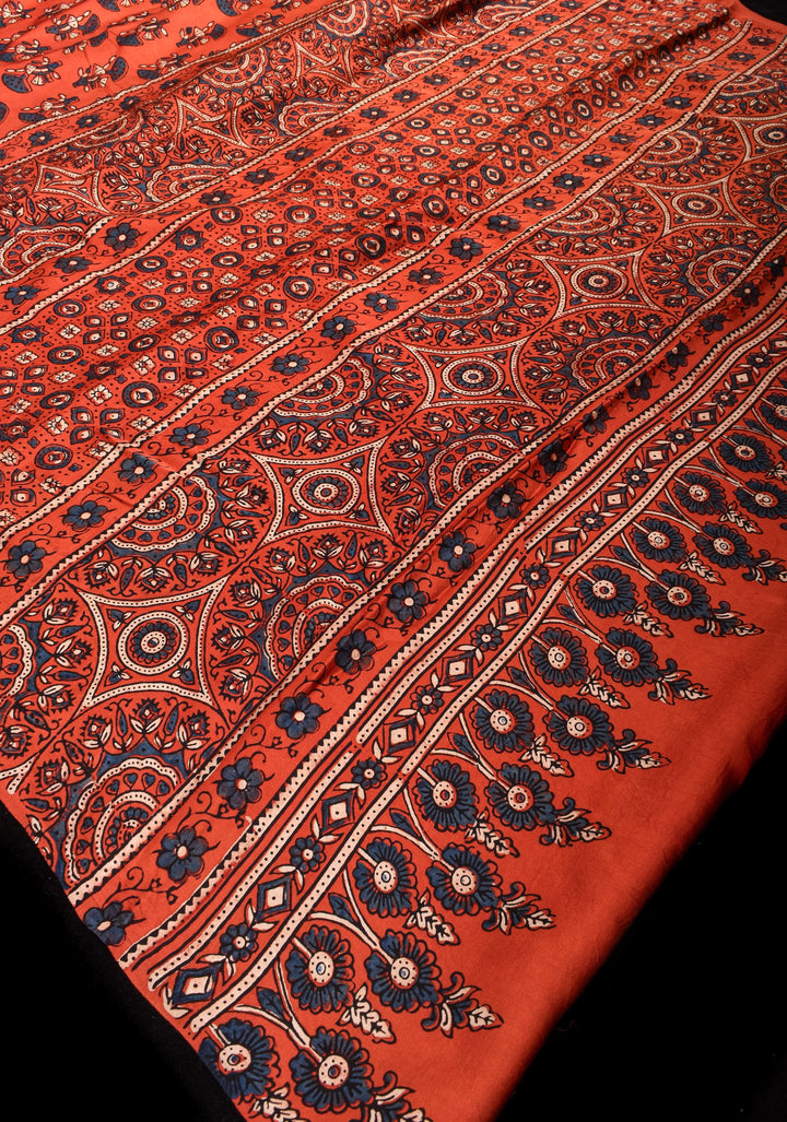 Peachy terracotta Ajrakh Hand Block Print Modal Silk Saree with Floral Pattern