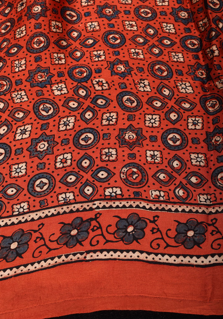 Peachy terracotta Ajrakh Hand Block Print Modal Silk Saree with Floral Pattern
