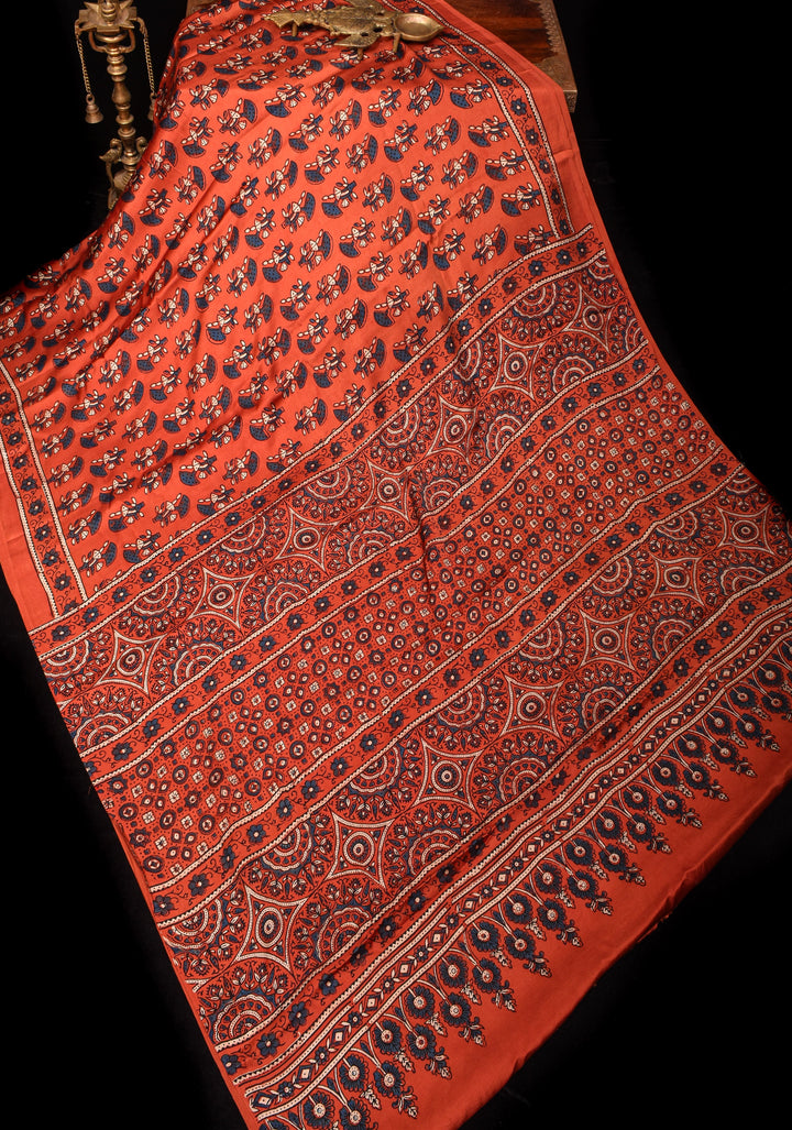 Peachy terracotta Ajrakh Hand Block Print Modal Silk Saree with Floral Pattern