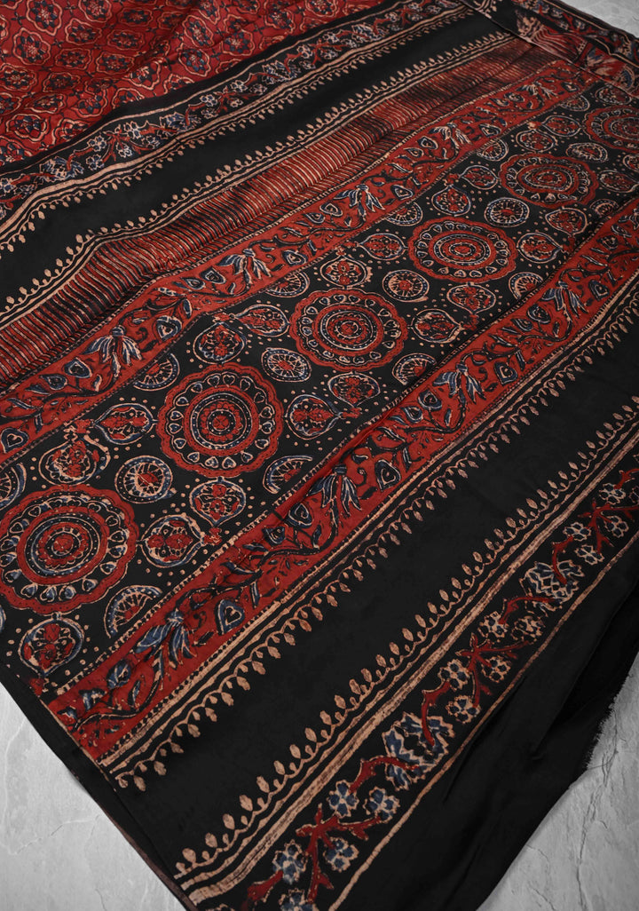 Brick Red Ajrakh hand Block Prints on Modal Silk Saree with Floral Hand Block Print
