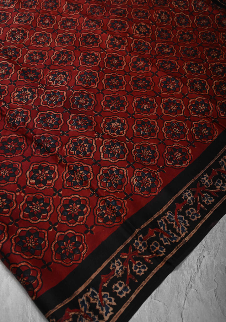 Brick Red Ajrakh hand Block Prints on Modal Silk Saree with Floral Hand Block Print
