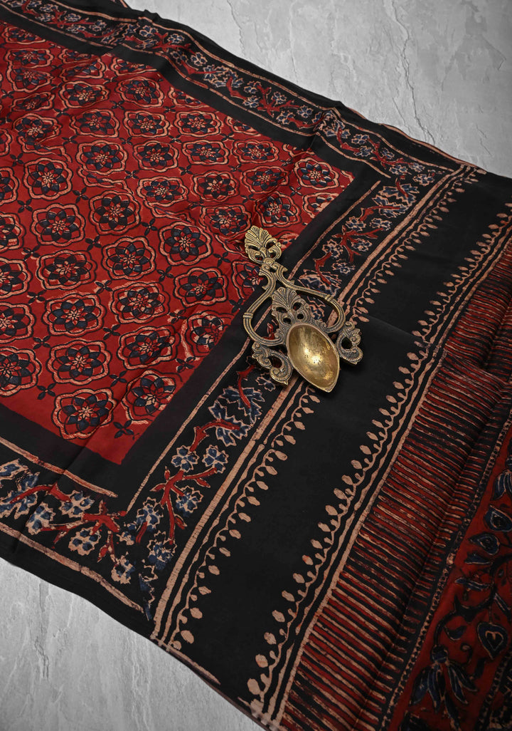 Brick Red Ajrakh hand Block Prints on Modal Silk Saree with Floral Hand Block Print