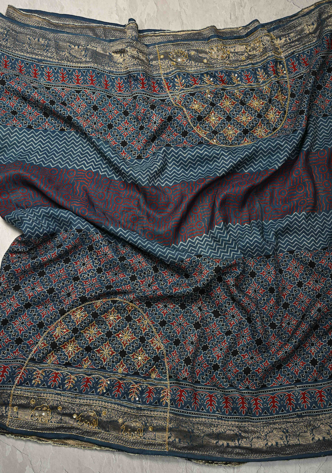 Indigo Ajrakh Hand Block Print on Dola Silk Saree with Cutdana-Sequins Work and Fancy Zari Border