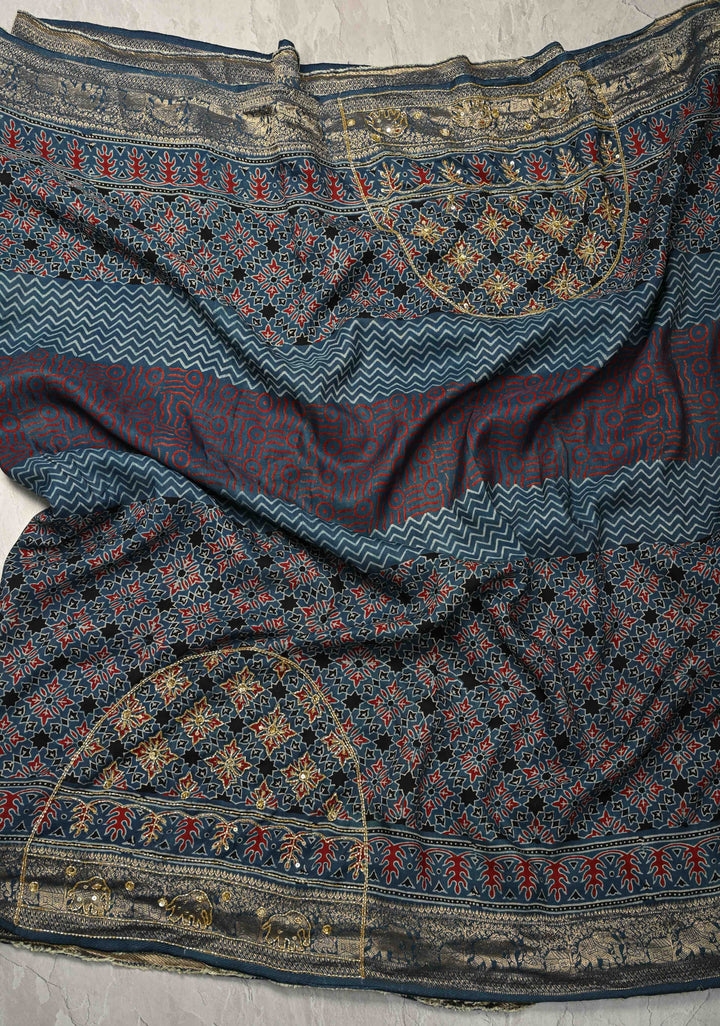 Indigo Ajrakh Hand Block Print on Dola Silk Saree with Cutdana-Sequins Work and Fancy Zari Border
