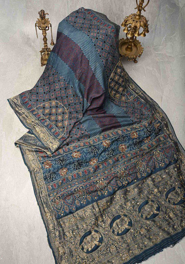 Indigo Ajrakh Hand Block Print on Dola Silk Saree with Cutdana-Sequins Work and Fancy Zari Border