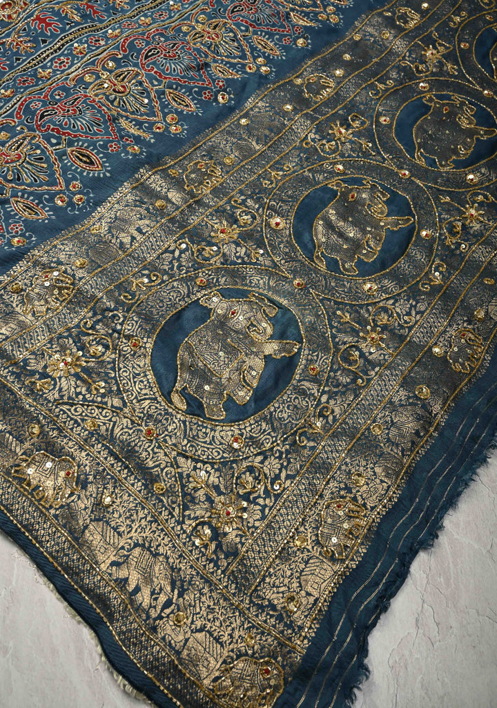 Indigo Ajrakh Hand Block Print on Dola Silk Saree with Cutdana-Sequins Work and Fancy Zari Border
