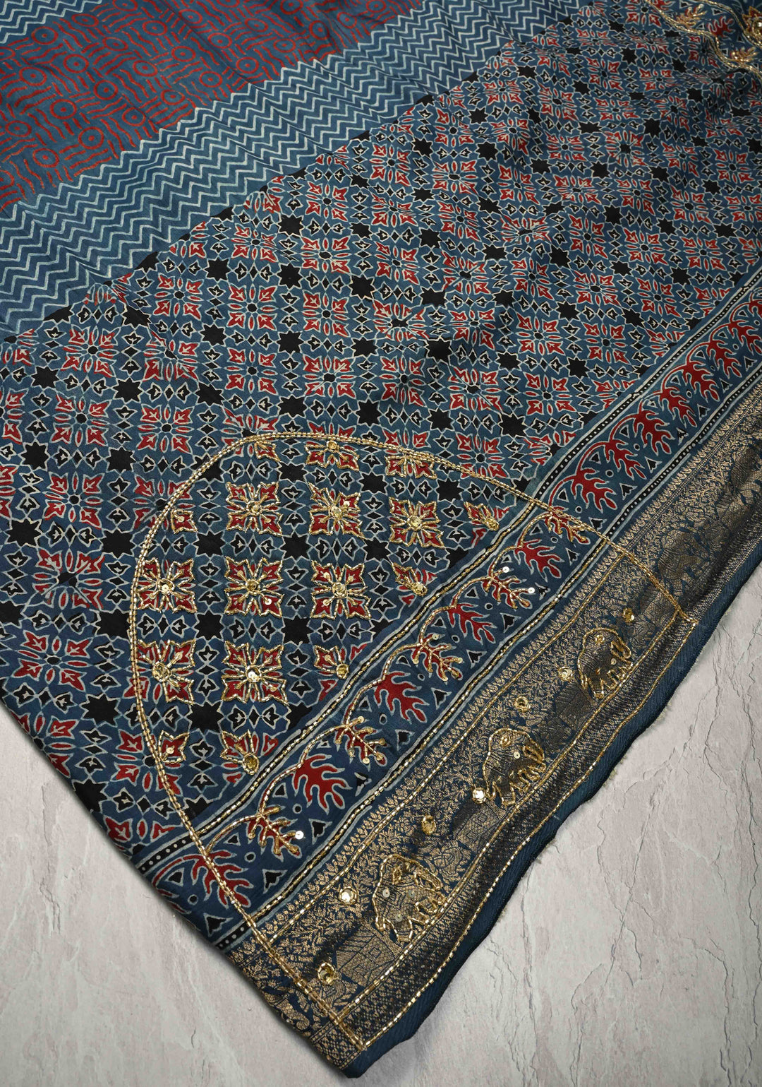 Indigo Ajrakh Hand Block Print on Dola Silk Saree with Cutdana-Sequins Work and Fancy Zari Border
