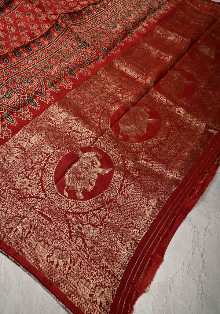 Deep Red Ajrakh Hand Block Print on Dola Silk Saree with Fancy Zari Border