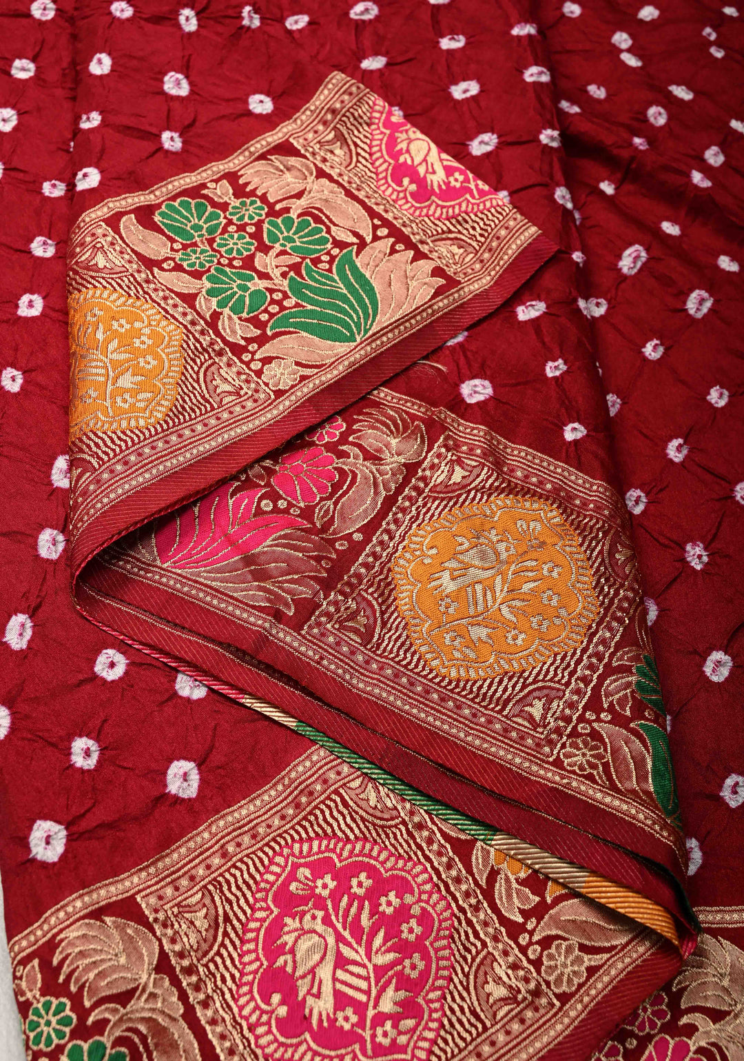 Maroon Crushed Bandhini on Art Silk Saree with Meenakari Zari Border and Village Theme Pallu