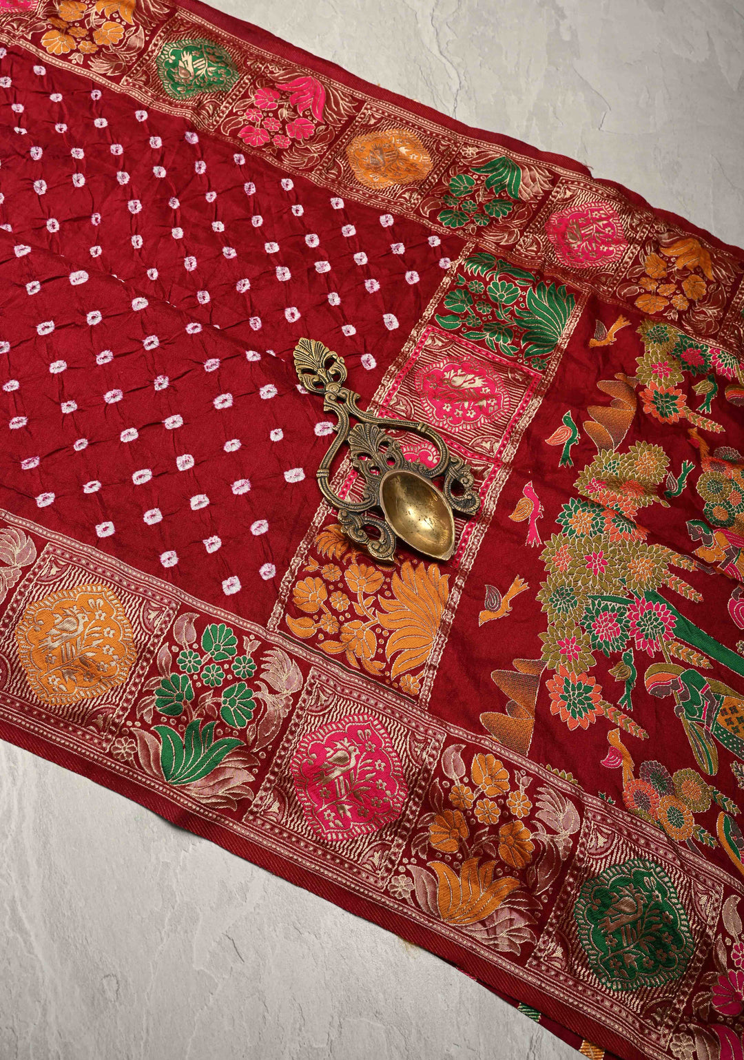 Maroon Crushed Bandhini on Art Silk Saree with Meenakari Zari Border and Village Theme Pallu