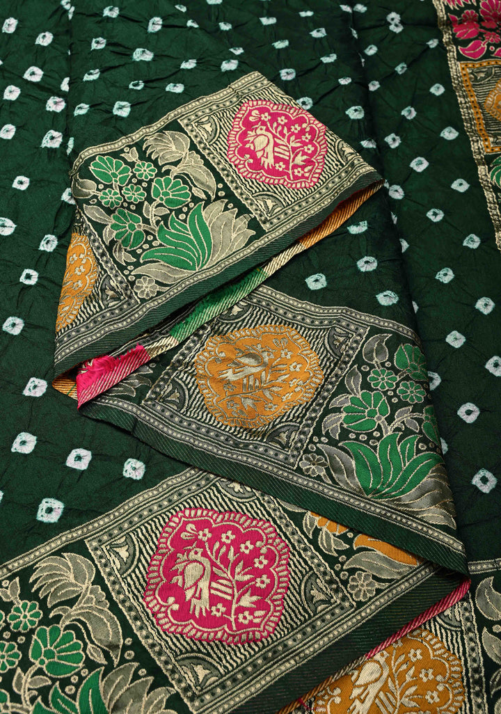Dark Green Crushed Bandhini on Art Silk Saree with Meenakari Zari Border and Village Theme Pallu