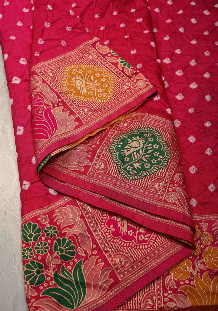 Rani Pink Crushed  Bandhani on Art Silk Saree with Meenakari Floral Zari Border and pallu