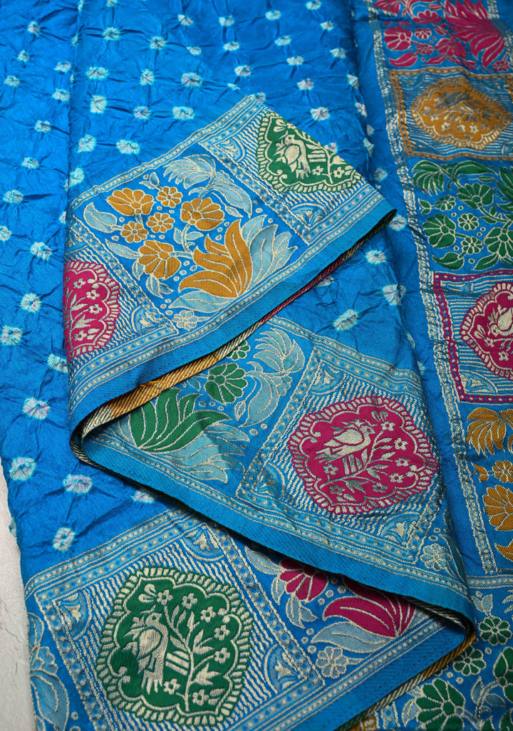 Copper Sulphate Blue Crushed  Bandhani on Art Silk Saree with Meenakari Floral Zari Border and Pallu