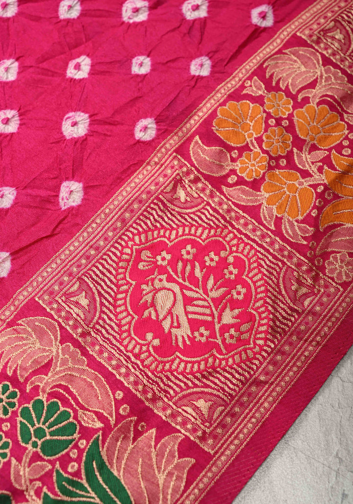 Fuchsia Pink Crushed Bandhini on Art Silk Saree with Meenakari Zari Border and Village Theme Pallu