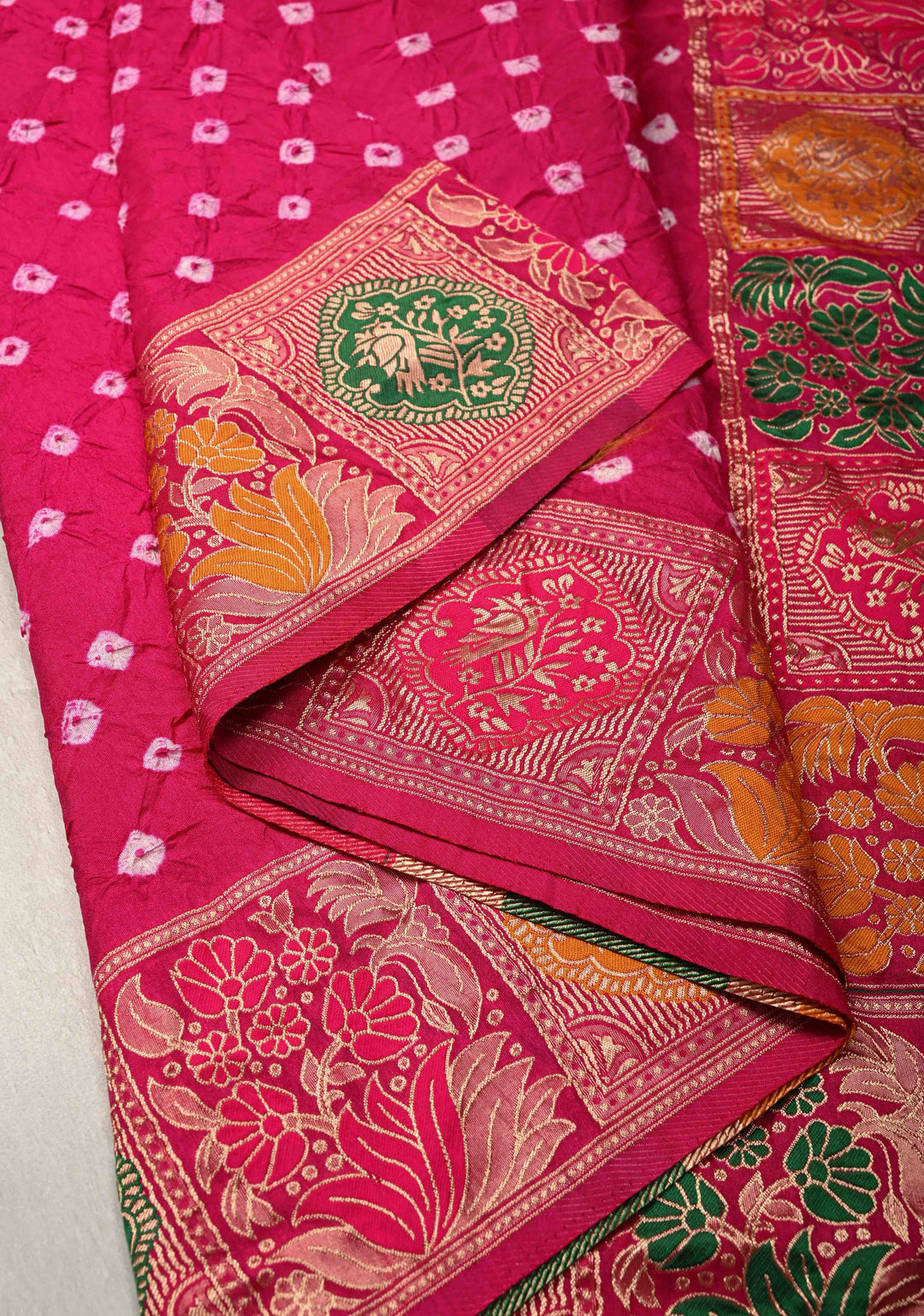 Fuchsia Pink Crushed Bandhini on Art Silk Saree with Meenakari Zari Border and Village Theme Pallu