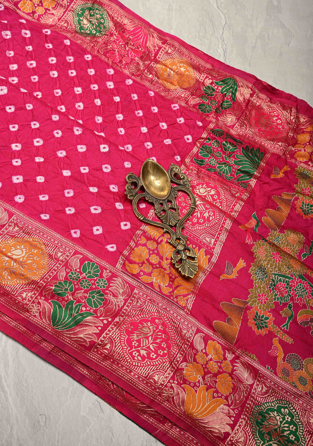 Fuchsia Pink Crushed Bandhini on Art Silk Saree with Meenakari Zari Border and Village Theme Pallu