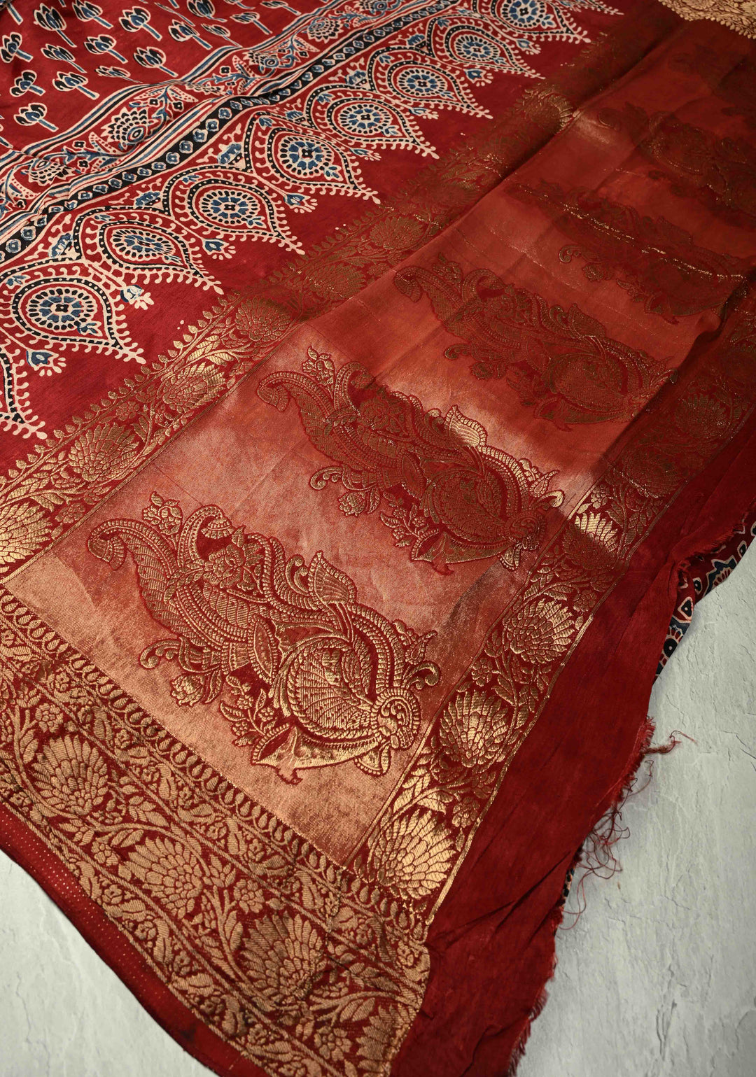 Brick Red Dola Silk Saree with Ajrakh Hand Block Print and Fancy Zari Border
