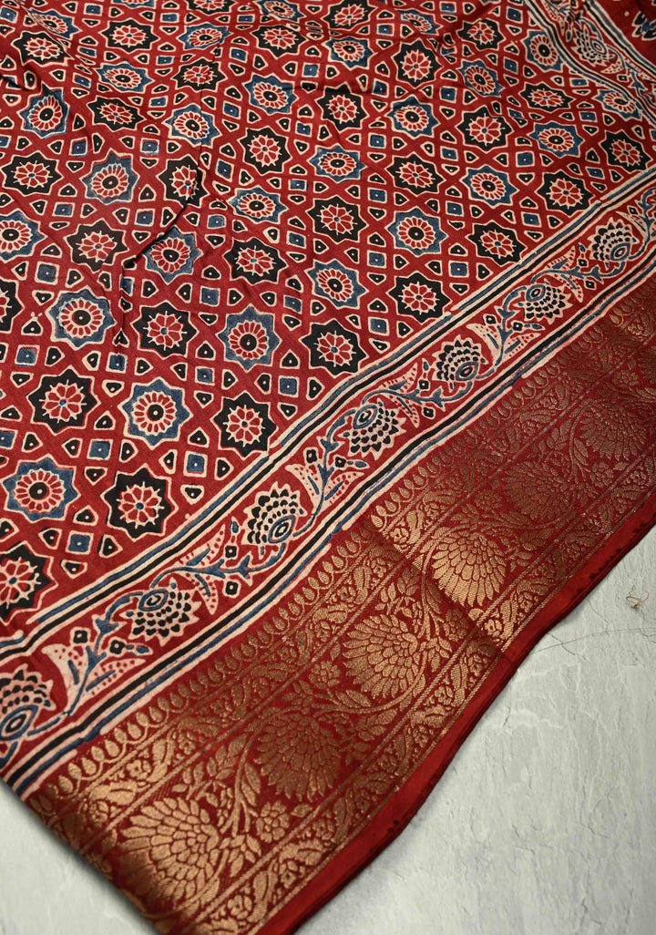 Brick Red Dola Silk Saree with Ajrakh Hand Block Print and Fancy Zari Border