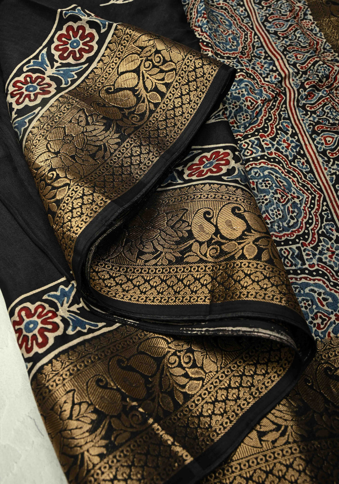 Black Dola Silk Saree with Floral Hand Block Print and Fancy Zari Border