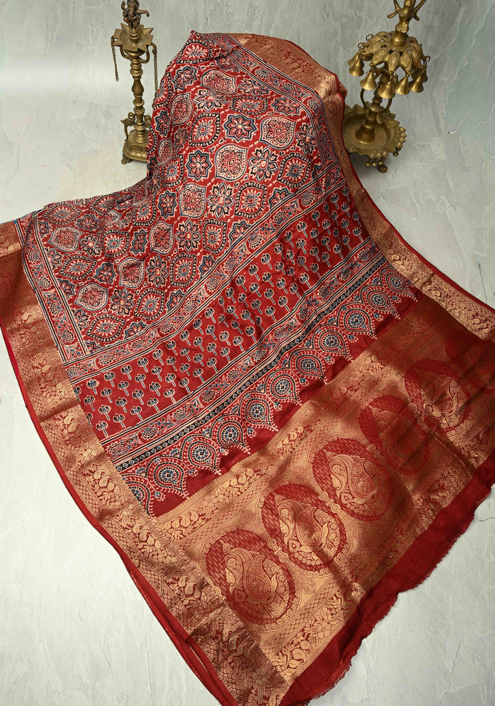 Blood Red Dola Silk Saree with Ajrakh Hand Block Print and Fancy Zari Border