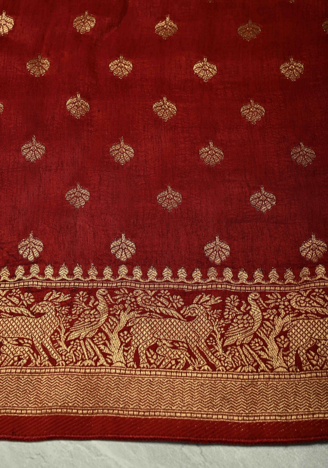 Maroon Dola Silk Saree with Hand Block Print and Shikargah Fancy Zari Border