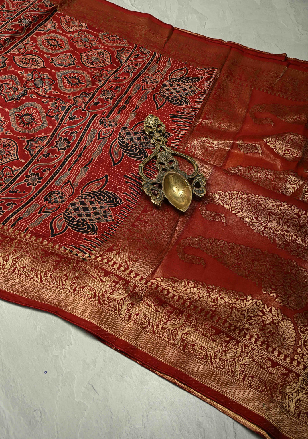 Maroon Dola Silk Saree with Hand Block Print and Shikargah Fancy Zari Border