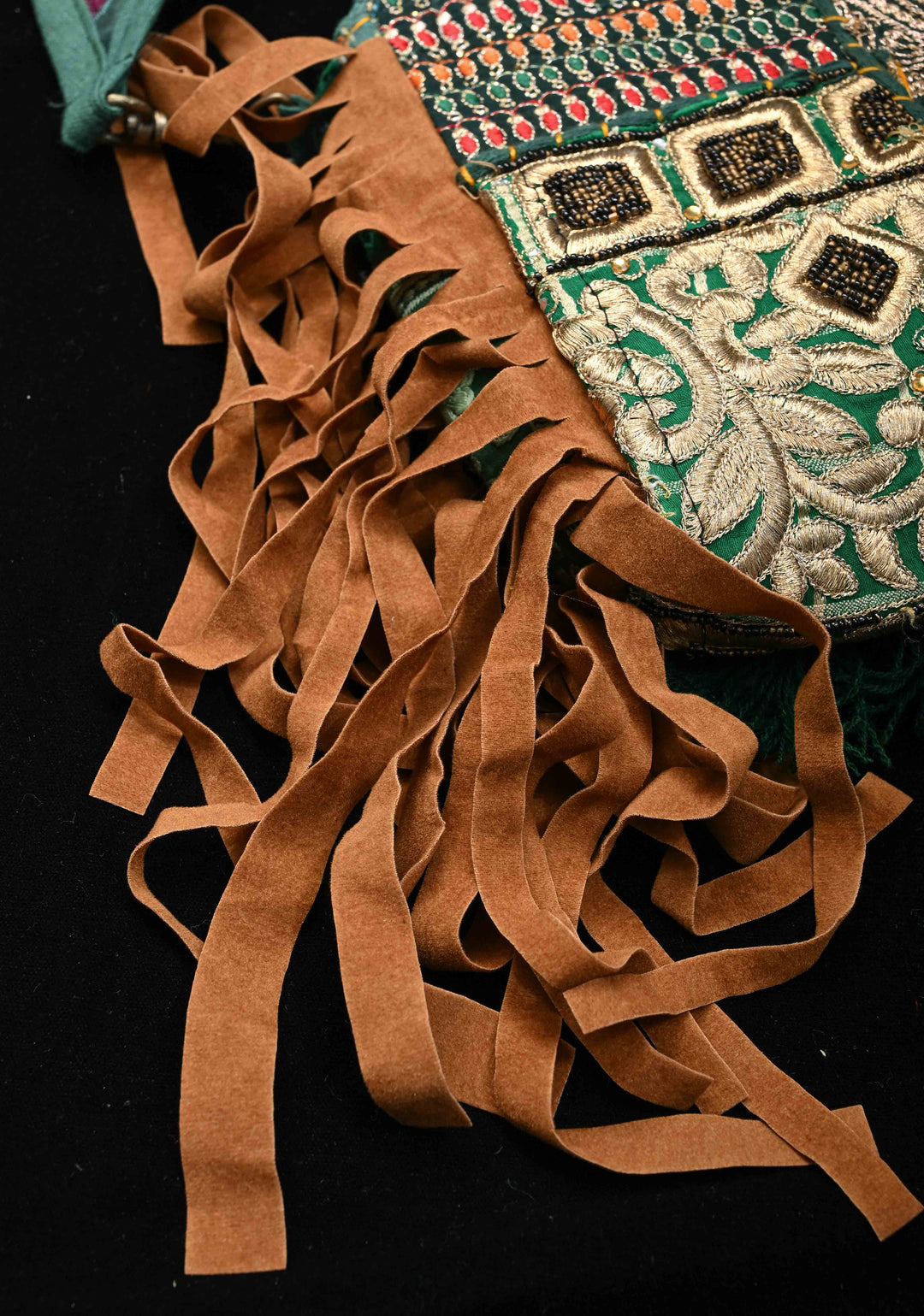 Green Hand-Embraided Ethnic Embellished Banjara Boho Sling Bag with Cowrie Shell