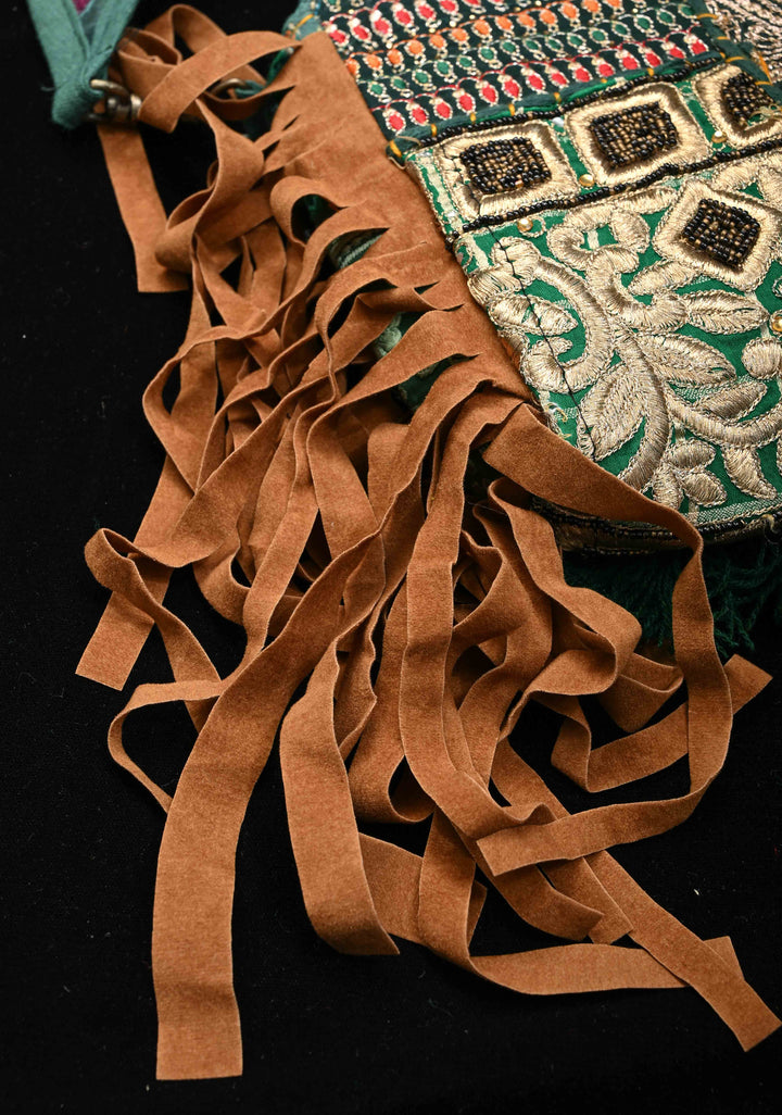 Green Hand-Embraided Ethnic Embellished Banjara Boho Sling Bag with Cowrie Shell