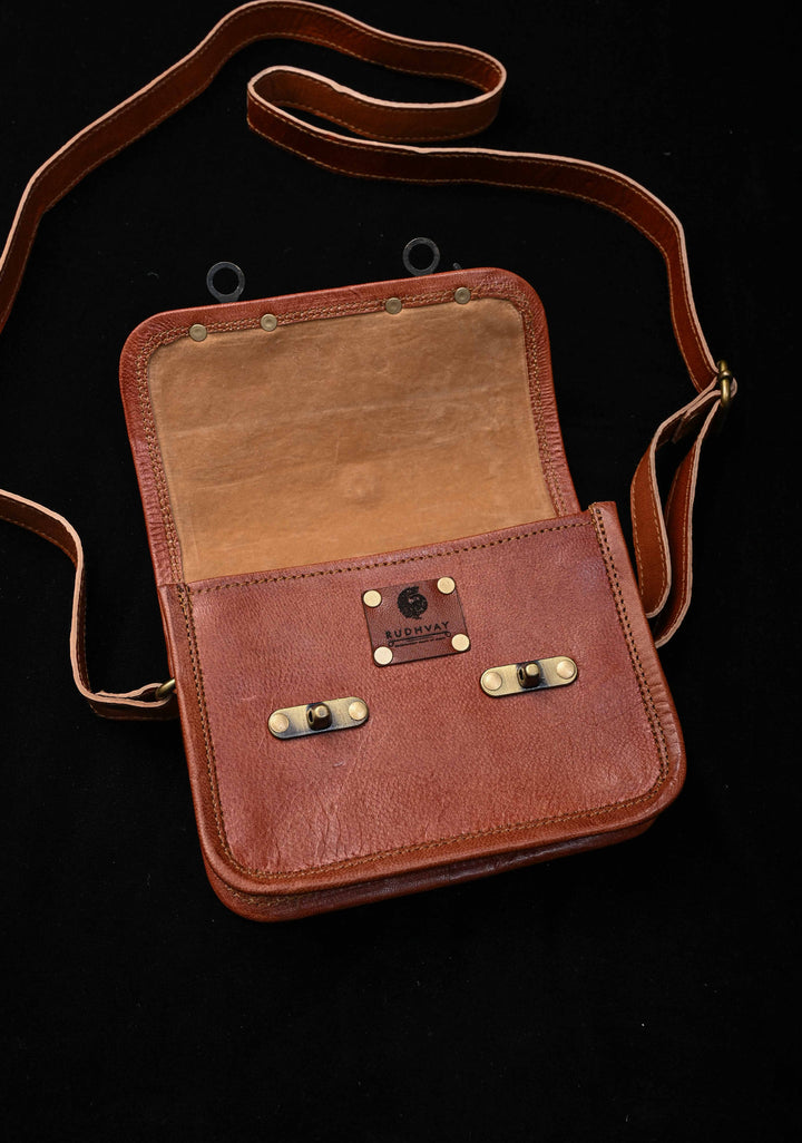 Brown Leather Double Buckle Sling Bag With Hand-Crafted And Embroidery
