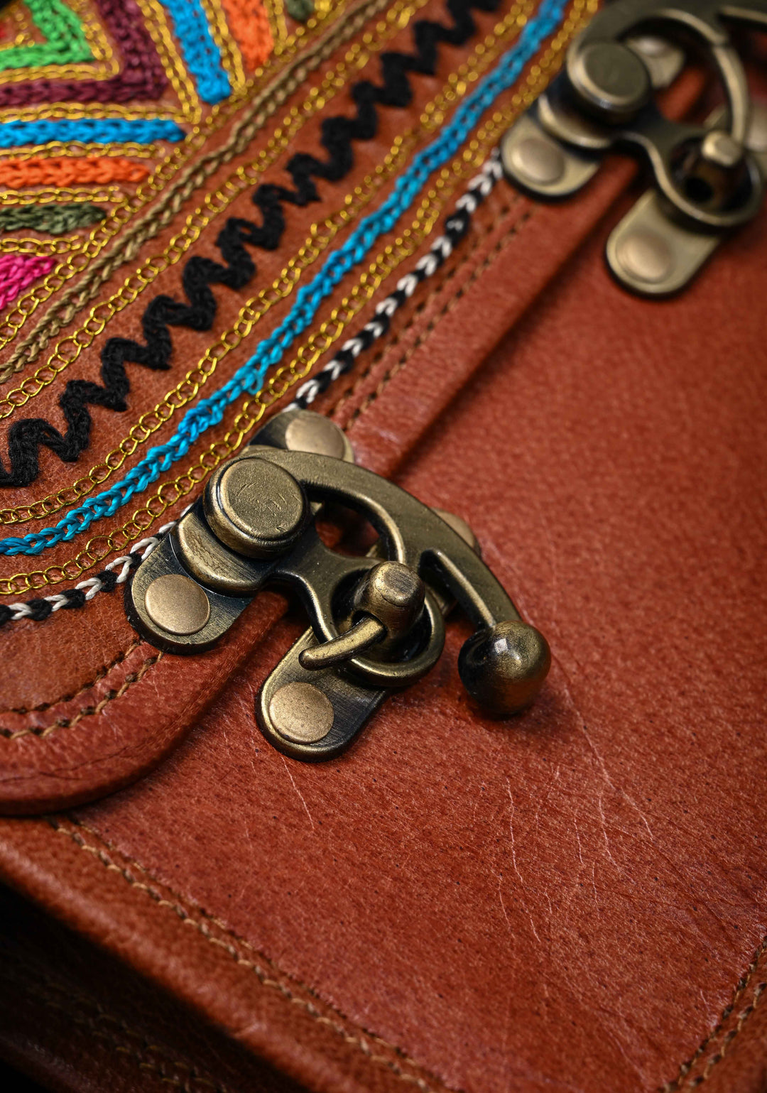 Brown Leather Double Buckle Sling Bag With Hand-Crafted And Embroidery