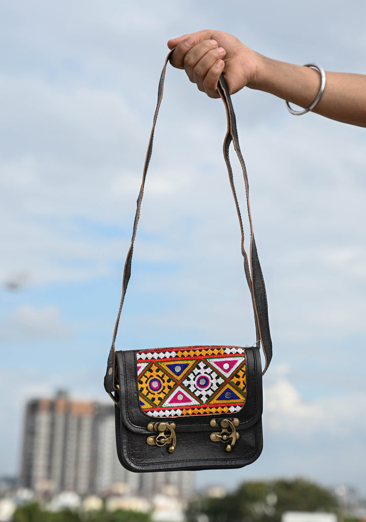 Leather Double Buckle Black Sling Bag With Hand-Crafted And Embroidery