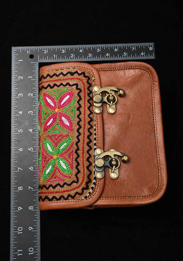 Brown Leather Double Buckle Sling Bag With Hand-Crafted And Floral Embroidery