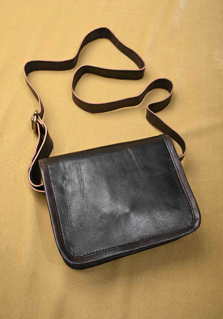 Black Leather Double Buckle Sling Bag With Hand-Crafted And Leaf Embroidery