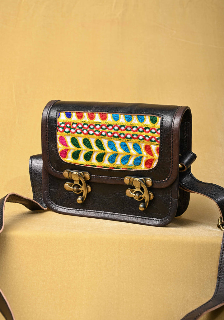 Black Leather Double Buckle Sling Bag With Hand-Crafted And Leaf Embroidery