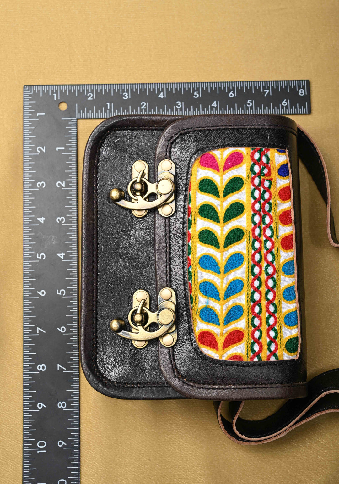 Black Leather Double Buckle Sling Bag With Hand-Crafted And Leaf Embroidery