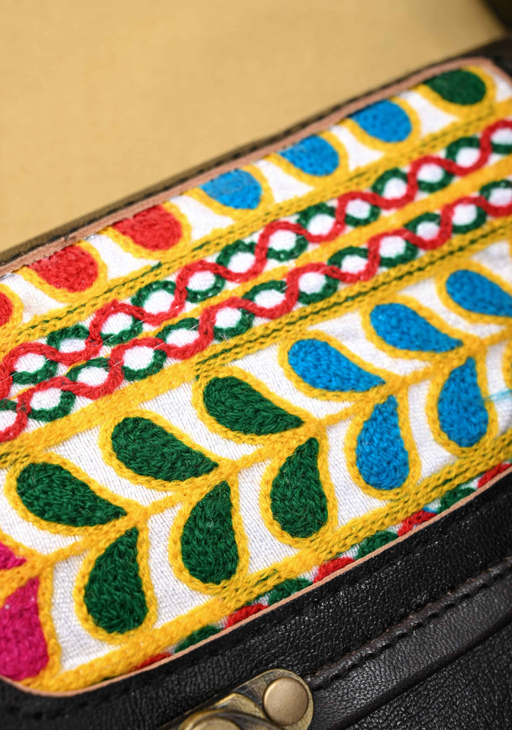 Black Leather Double Buckle Sling Bag With Hand-Crafted And Leaf Embroidery
