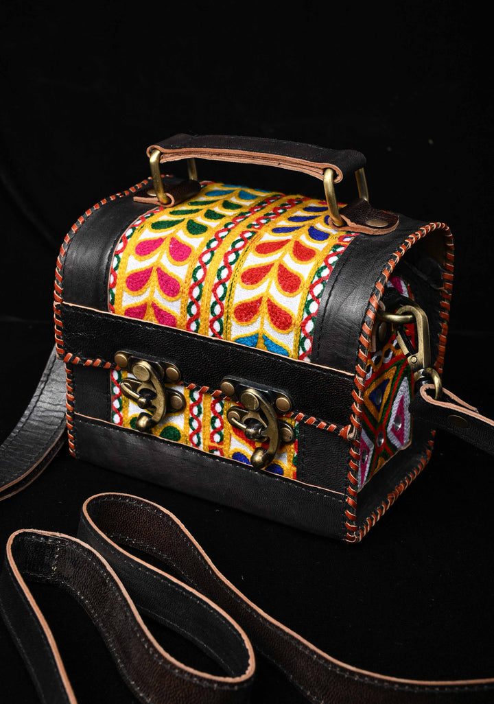 Black Leather Double Buckle Hut Bag With Hand-Crafted And Leaf Embroidery
