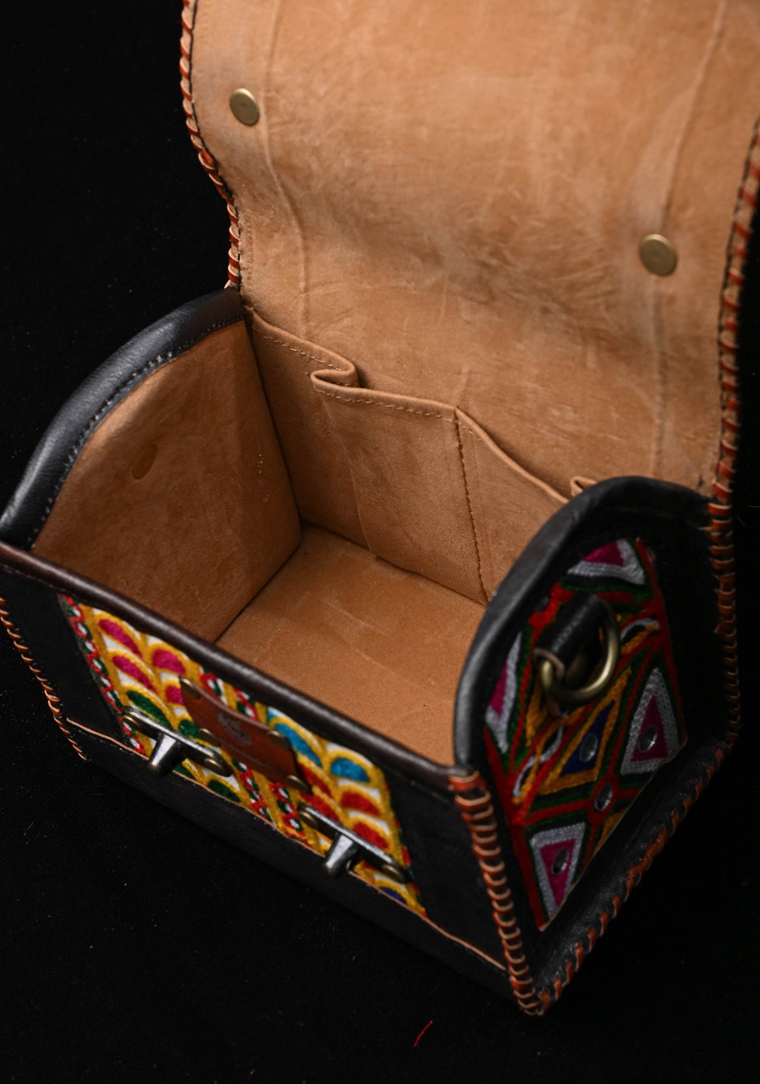 Black Leather Double Buckle Hut Bag With Hand-Crafted And Leaf Embroidery