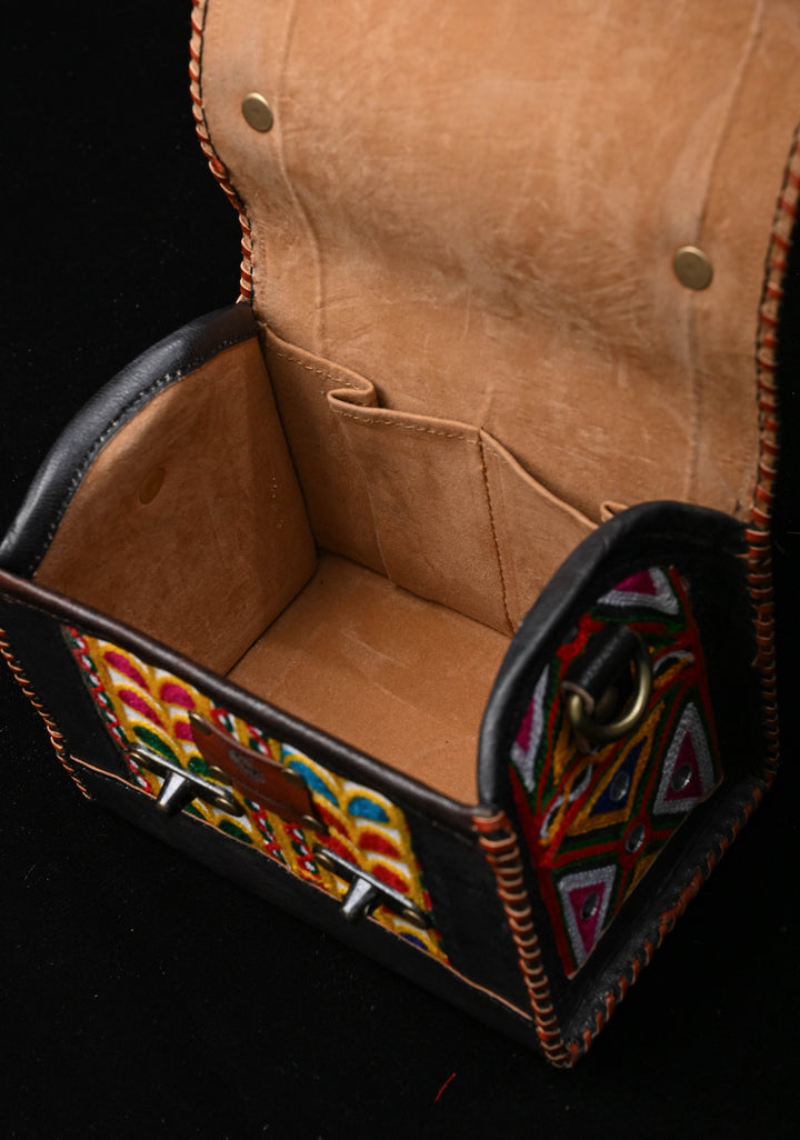 Black Leather Double Buckle Hut Bag With Hand-Crafted And Leaf Embroidery