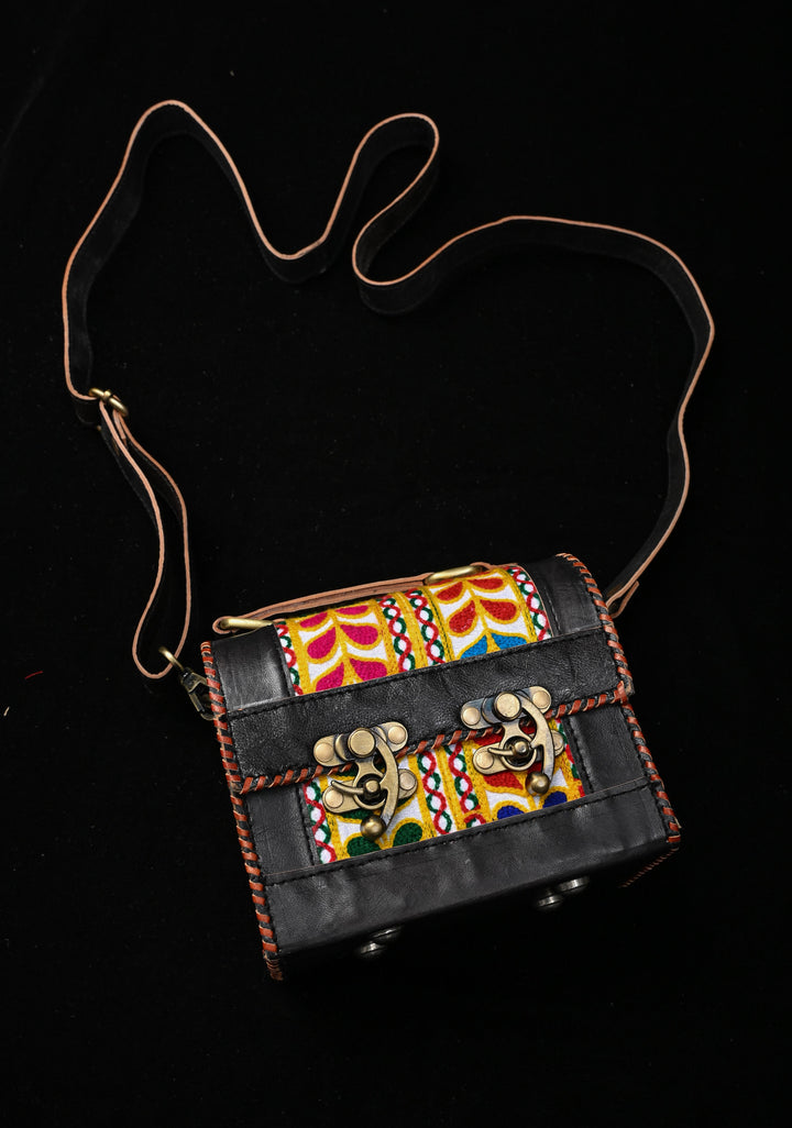 Black Leather Double Buckle Hut Bag With Hand-Crafted And Leaf Embroidery
