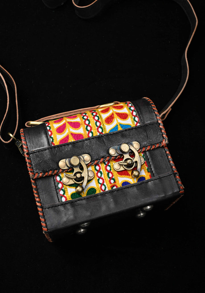 Black Leather Double Buckle Hut Bag With Hand-Crafted And Leaf Embroidery
