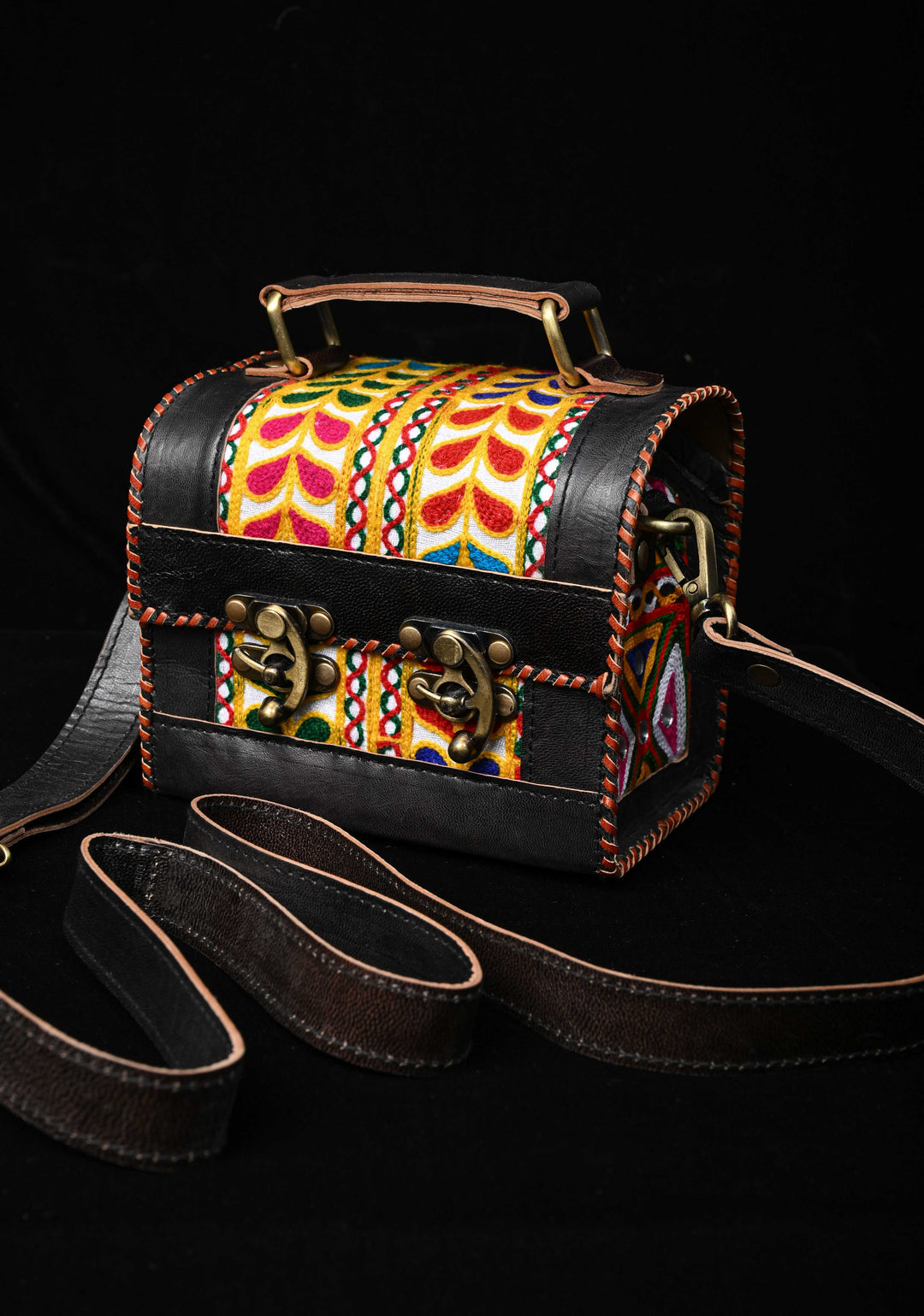 Black Leather Double Buckle Hut Bag With Hand-Crafted And Leaf Embroidery