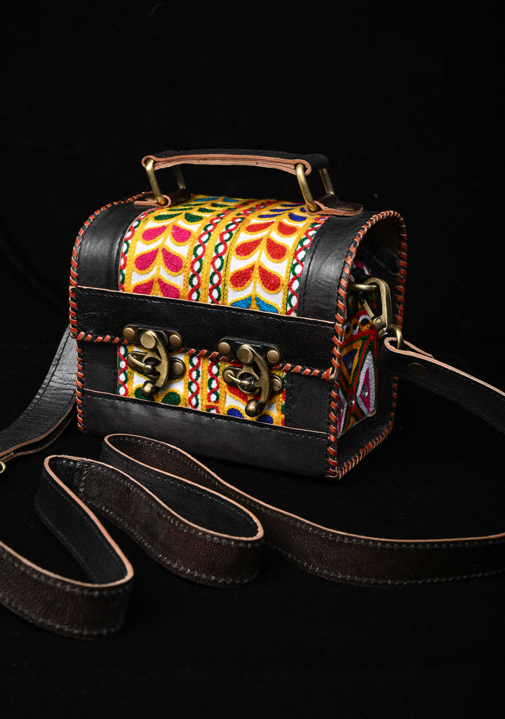 Black Leather Double Buckle Hut Bag With Hand-Crafted And Leaf Embroidery