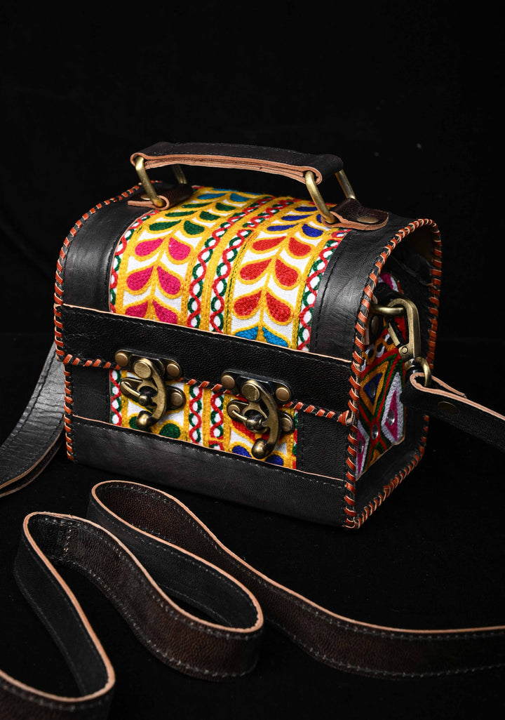 Black Leather Double Buckle Hut Bag With Hand-Crafted And Leaf Embroidery